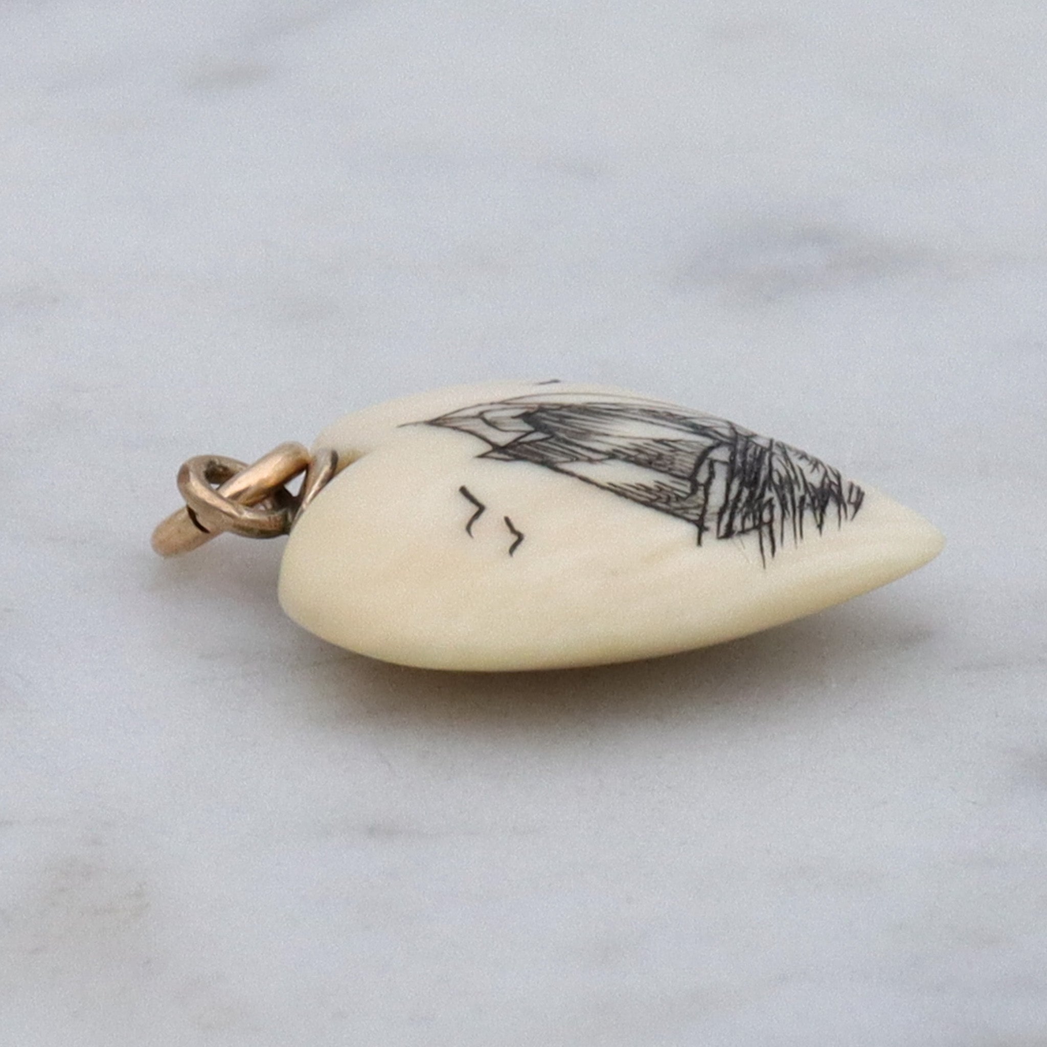 Antique hand carved faux ivory sailboat heart charm pendant